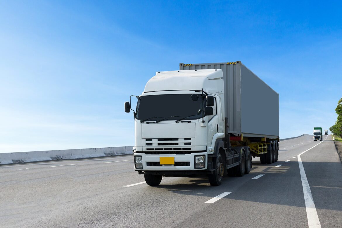 Truck on highway road with container, transportation concept.,im